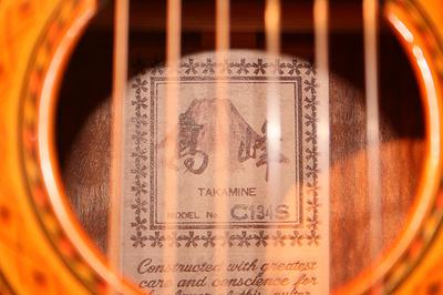 Takamine guitar logo inside instrument. Photo used under a creative commons licence with the kind permission of rabidmuskrat and Flickr